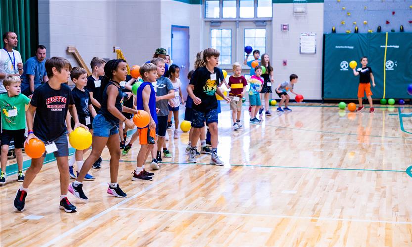 Students prepare to play dodgeball